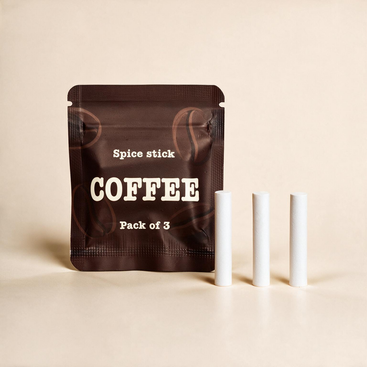 QuitAir Coffee Verpackung mit drei einzelnen Aroma-Kernen daneben