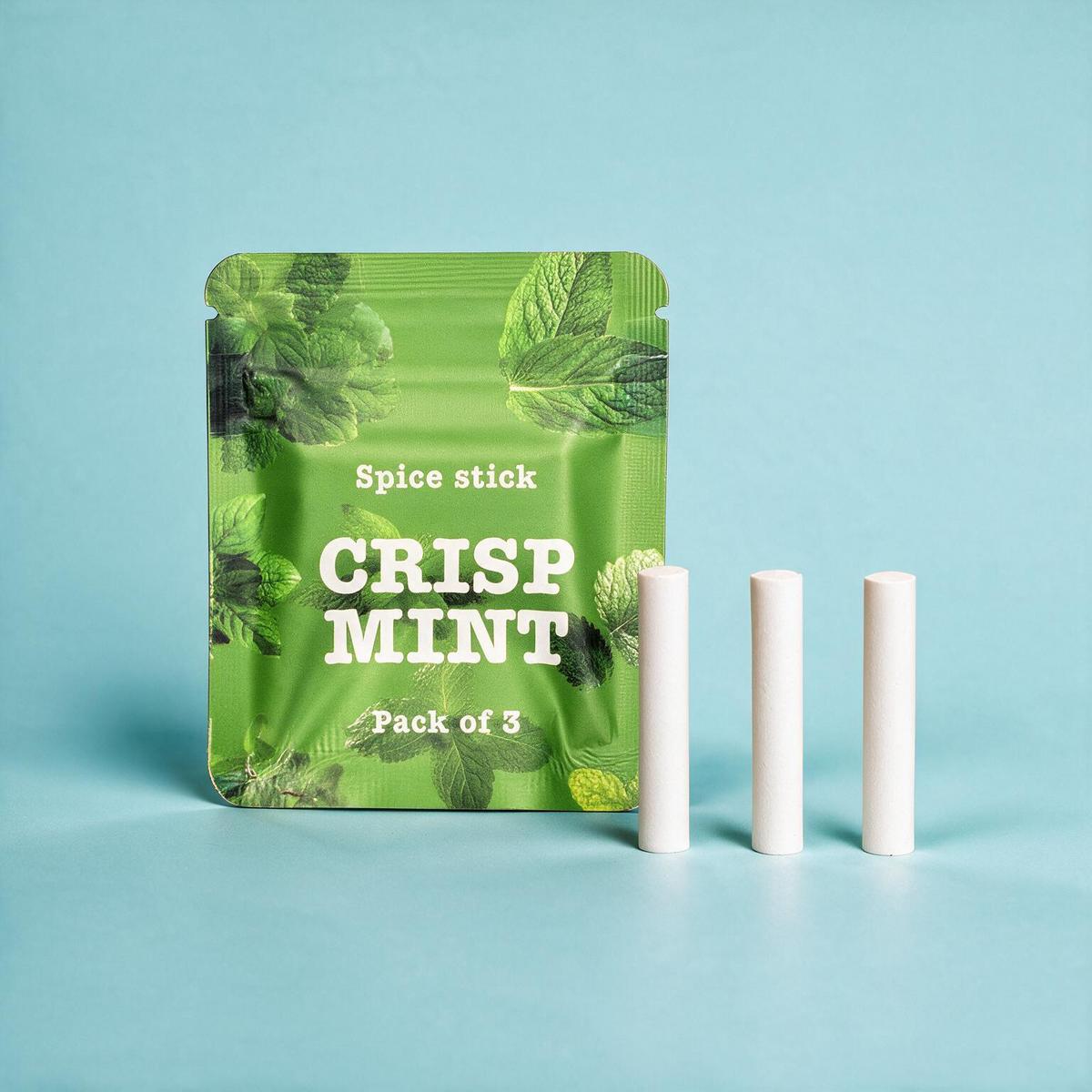 QuitAir Crisp Mint Verpackung mit drei einzelnen Aroma-Kernen daneben
