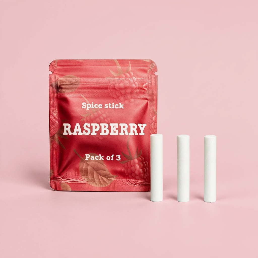 QuitAir Raspberry Verpackung mit drei einzelnen Aroma-Kernen daneben